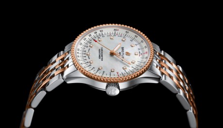 12_Two-tone Navitimer Automatic 35 with a white mother-of-pearl dial with diamond hour markers and a luxurious 18 k red gold bezel